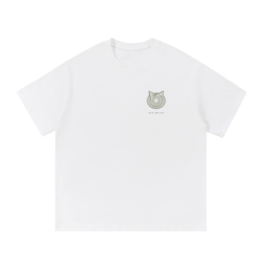 Front of a heavyweight cotton tee in White with a small geometric line-art cat on the left chest.