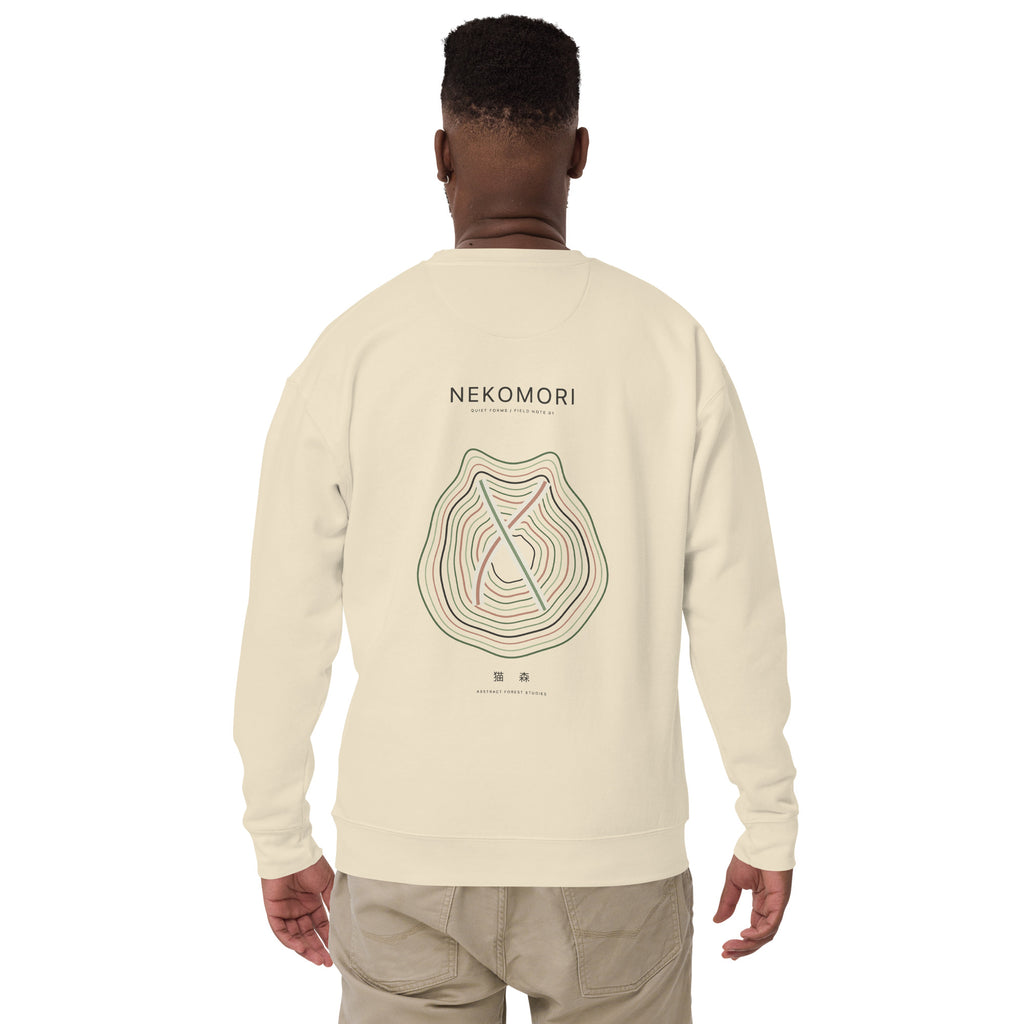 Back of the bone unisex sweatshirt, printed with a large topographic contour-line cat graphic crossed by a single diagonal.