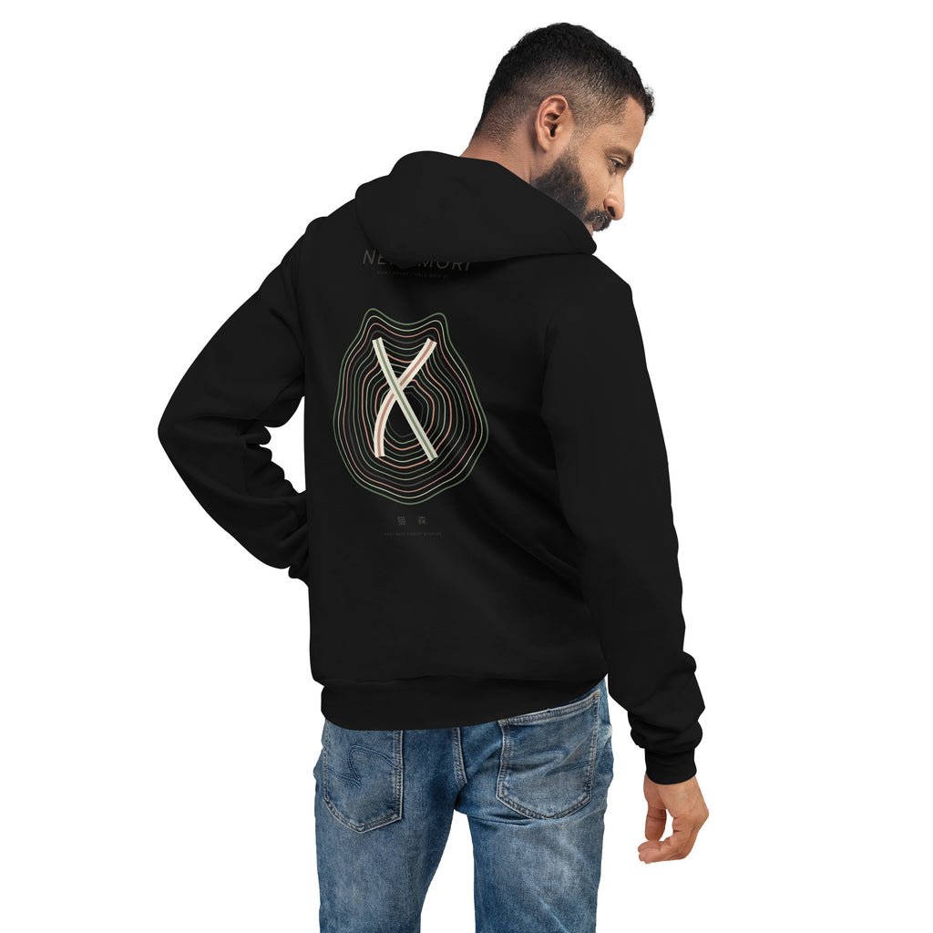 Model seen from behind in the black cat hoodie, the large contour-line cat graphic filling the back panel.
