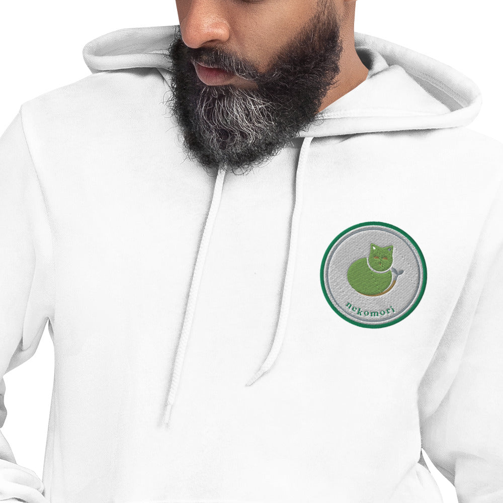 Close-up of the contour cat print on white fleece, showing the forest-green concentric line work.